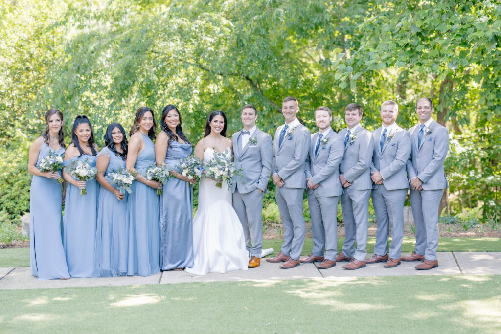 bridal party lined up at Country Club of the South wedding venue