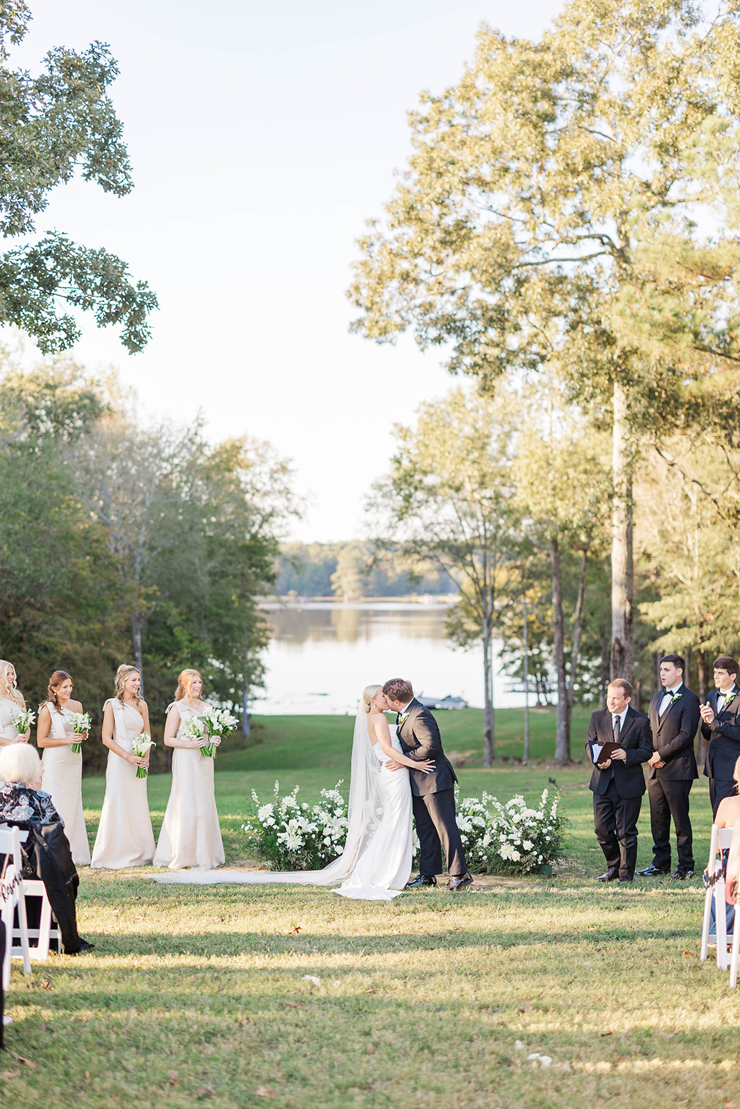 bride and groom kiss on wedding day in Georgia