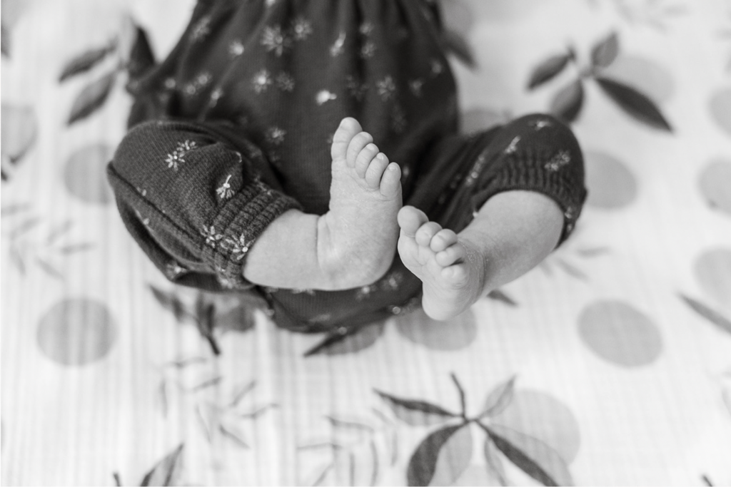 newborn baby feet photo in black and white