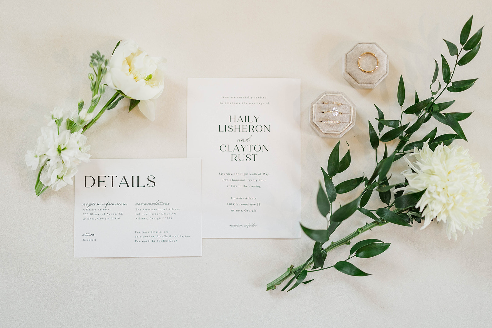 Details of wedding invitations with flowers and rings