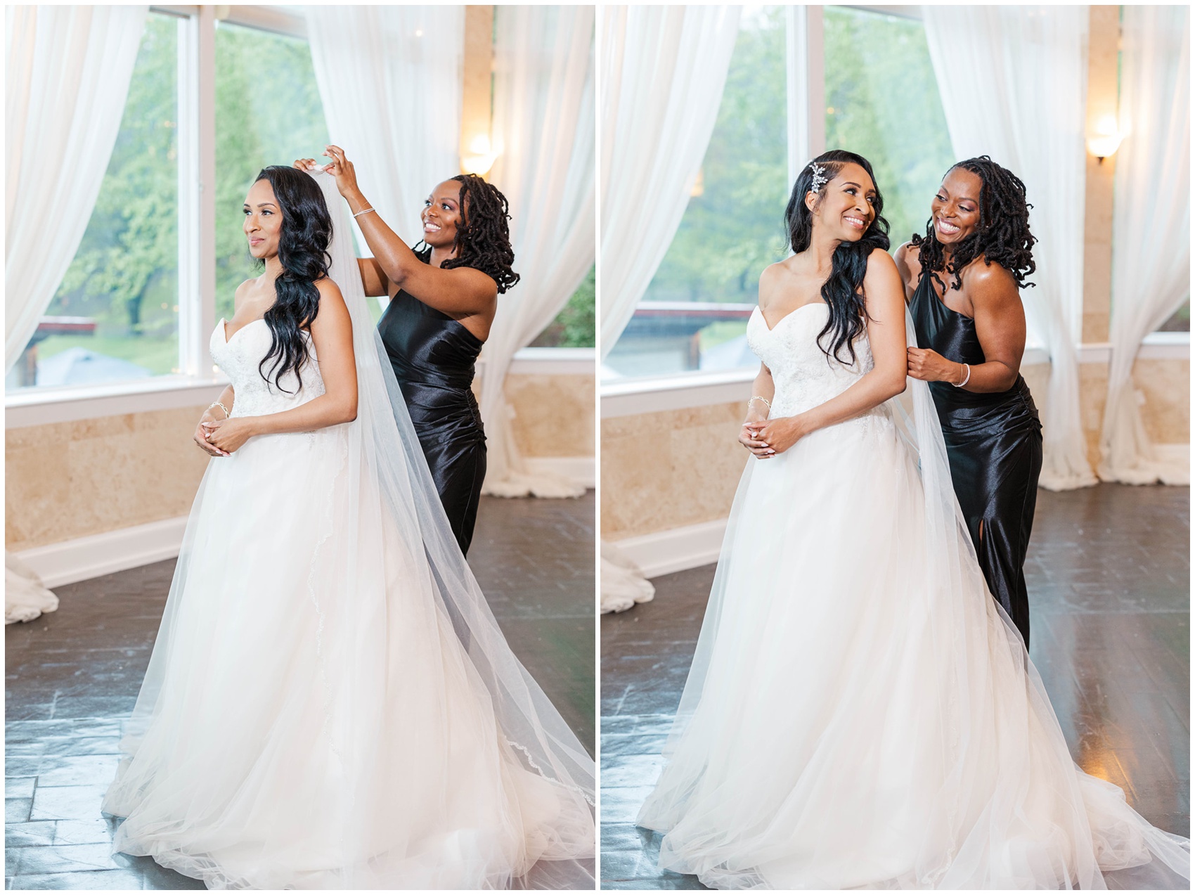A bridesmaid helps the bride put on her veil while standing in a large window