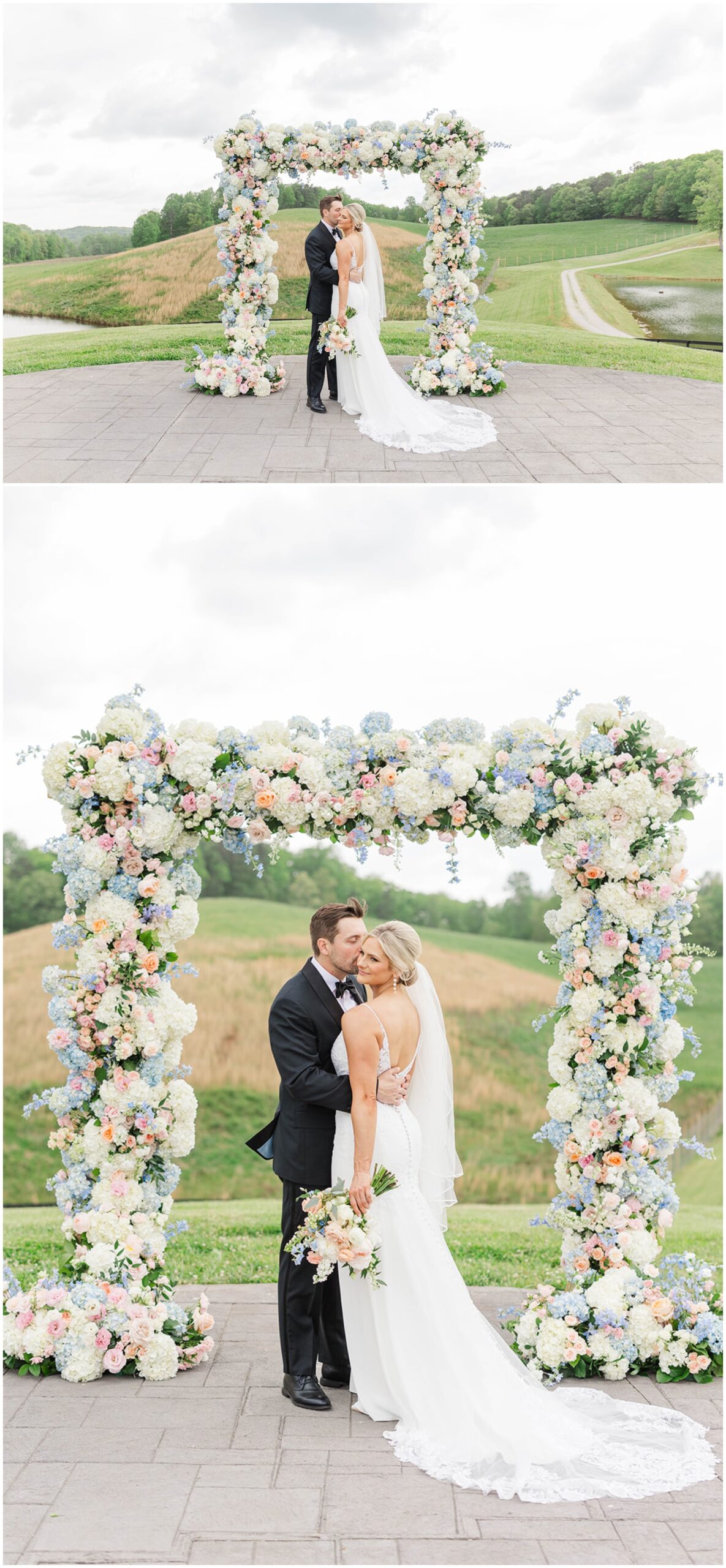 Newlyweds snuggle under the floral arch with a beautiful hilly backdrop