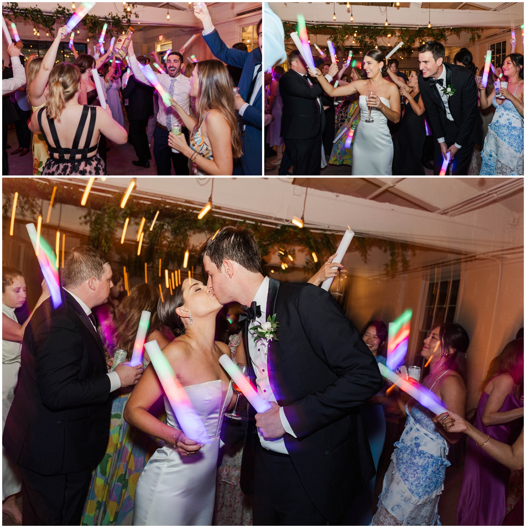 Newlyweds dance and kiss while holding glow sticks with guests at their Upstairs Atlanta wedding